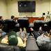 Members of the media check out the recliners and the 84-inch television in the players lounge at the Player Development Center during a tour on Tuesday. Melanie Maxwell I AnnArbor.com